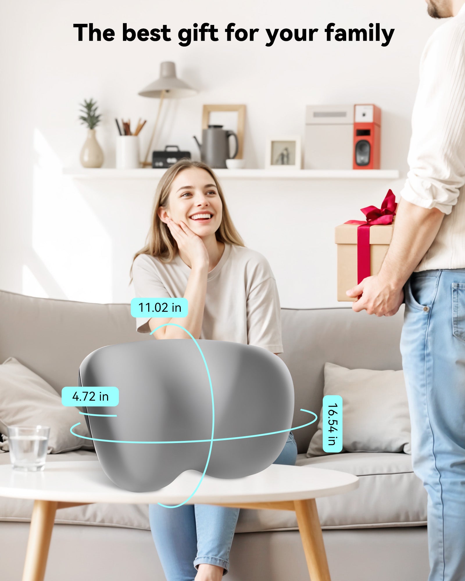 Woman smiling as she receives a gift at home, showcasing the ideal family present.